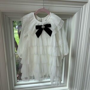 Elegant White Tulle Girls Dress with Black Bow Size 5 from Petite Hailey